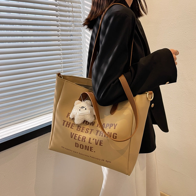 high-capacity Bag female 2022 new pattern tide Spring and summer One shoulder attend class;class begins Commuter Bag Minority Design Advanced sense Tote Bag